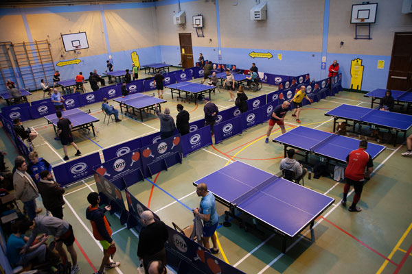 Players enjoying table tennis at the club