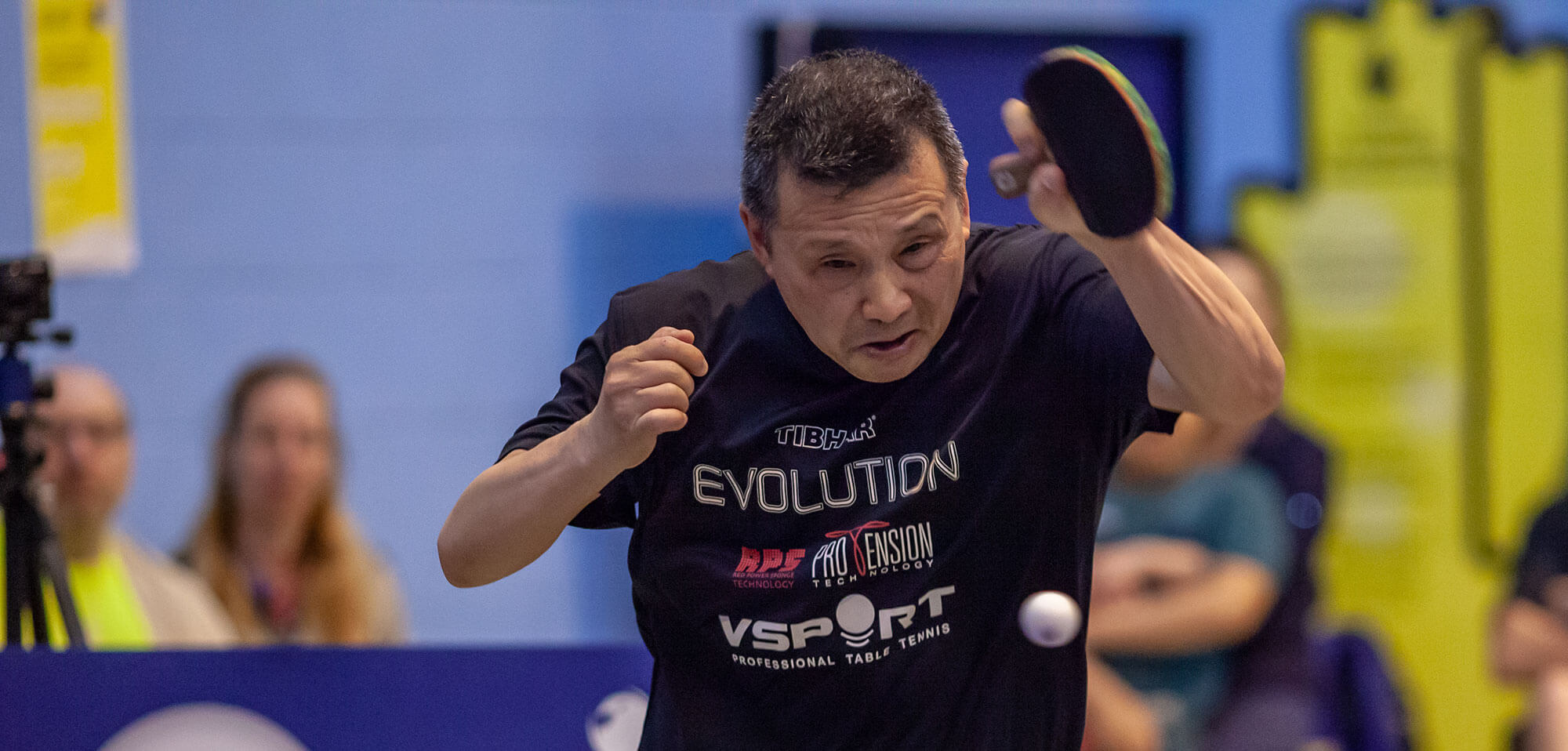 He Zhi Wen playing table tennis at Loop